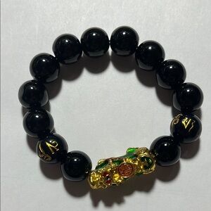 Elegant Black Beaded Bracelet with Gold Accents